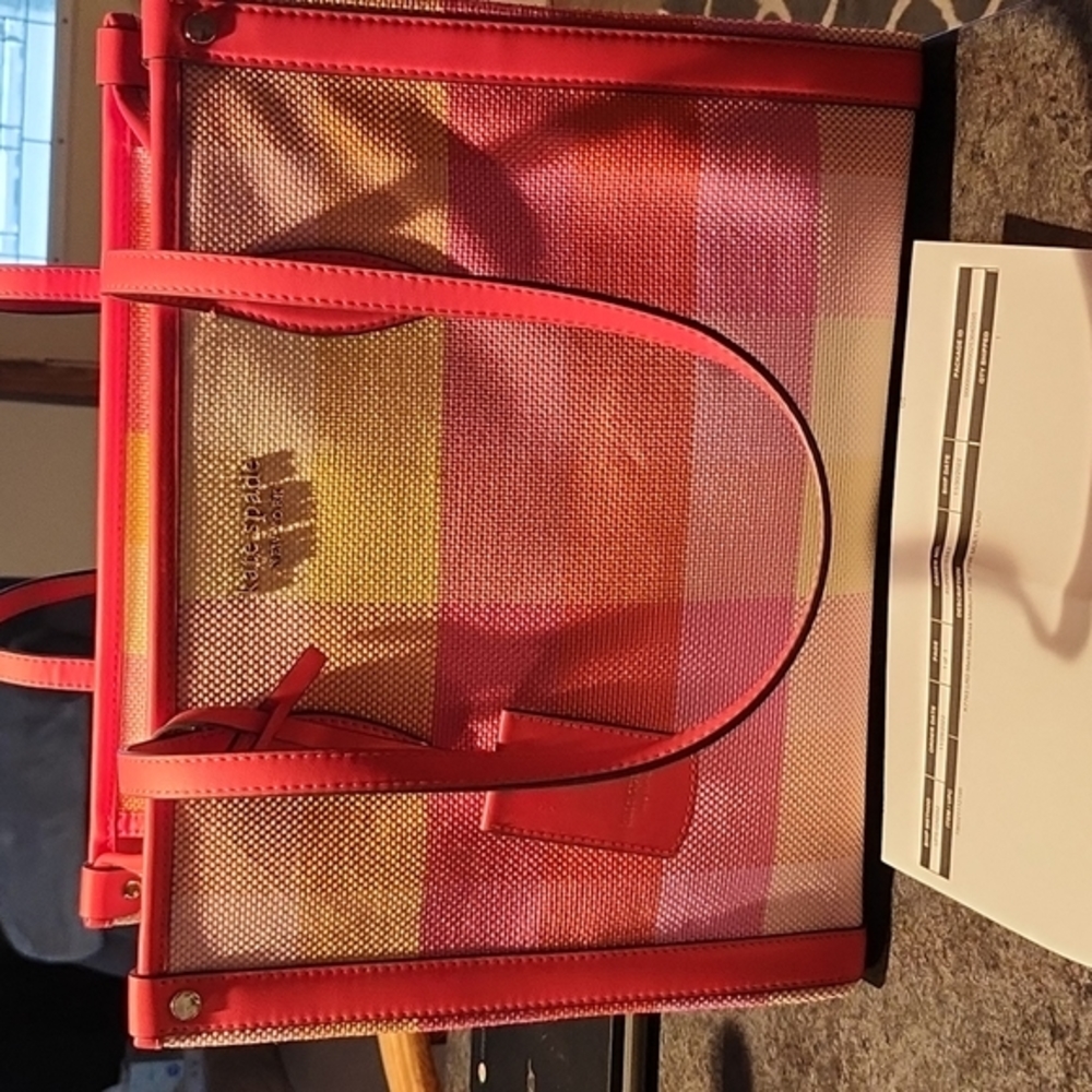 Kate spade bag. Brand new, 14"L x 11"H x 6"W. Beautiful pink, yellow, orange